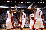 Miami, FL - June 17: Dwyane Wade, LeBron James and Chris Bosh Photographic Print by Mike Ehrmann
