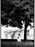 A Little Girl Picking Flowers in Florence, Italy Photographic Print by Chris Hill