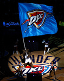 Oklahoma City, OK - June 12: The Oklahoma City Thunder mascot waves a flag at center court Photographic Print by Mike Ehrmann