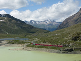 The Glacier Express Train Near St. Moritz, Canton Graubunden, Swiss Alps, Swiitzerland, Europe Photographic Print by Angelo Cavalli