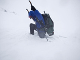An Extreme Trekker Struggles in Deep Snow Photographic Print by Michael Christopher Brown