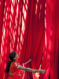 Woman in Sari Checking the Quality of Freshly Dyed Fabric Hanging to Dry, Sari Garment Factory, Raj Photographic Print by Gavin Hellier