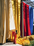 Woman in Sari Checking the Quality of Freshly Dyed Fabric Hanging to Dry, Sari Garment Factory, Raj Photographie par Gavin Hellier