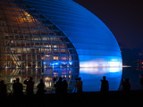 National Centre for the Performing Arts, Illuminated in Blue Light at Night During National Day Fes Photographic Print by Kimberly Walker