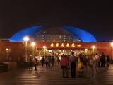 National Centre for the Performing Arts, Egg Shape Reflection, Illuminated During National Day Fest Photographic Print by Kimberly Walker