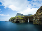Village of Gasadalur Overlooked by the 612M Heinanova Mountain, Vagar Island, Faroe Islands, Denmar Photographic Print by Kimberley Coole