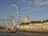 County Hall, Home of the London Aquarium, and the London Eye on the South Bank of the River Thames, Photographic Print by Stuart Forster