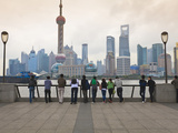 People Viewing the Pudong Skyline and the Oriental Pearl Tower from the Bund, Shanghai, China, Asia Photographic Print by Amanda Hall