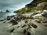 A Waterfall Cascading over the Black Sand Beach of Bour into the Sorvagsfjorour, Vagar Island, Faro Photographic Print by Kimberley Coole