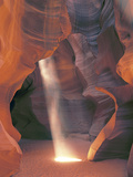 Sunbeam Illuminates Sandy Floor and Sandstone Walls of a Slot Canyon, Antelope Canyon, Page Fotografie-Druck von Dennis Flaherty