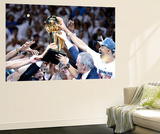 Miami, FL - June 21:  The Miami Heat celebrate with the Larry O'Brien Finals Championship trophy. Prints by Ronald Martinez
