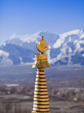 India, Ladakh, Thiksey, the Golden Finial of a Chorten at Thiksey Monastery Photographic Print by Katie Garrod