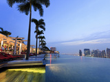Singapore, Swimmingpool and Singapore Skyline on the 57th Floor of Marina Bay Sands Resort Photographic Print by Michele Falzone