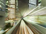 Asia, Japan, Honshu, Tokyo, Pov Blurred Motion of Tokyo Buildings from a Moving Train Photographic Print by Gavin Hellier