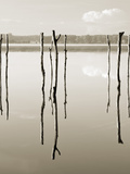 “Suspended in the Air” – Reflected in Water Remains of the Old Jetty on the Photographie par Nadia Isakova