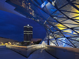 Twilight View of the Pedestrian Bridge Link to the BMW Headquarters Office Building and Museum, BMW Photographic Print by Cahir Davitt