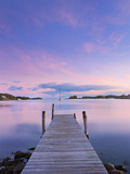 Norway, Oslo, Oslo Fjord, Jetty over Lake at Dusk Photographic Print by Shaun Egan