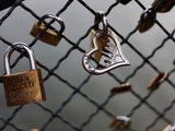 Locks on the Bridges of Paris are Quite Popular for Couples to Manifest their Wish for Eternal Love Photographic Print by David Bank