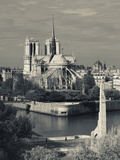 France, Paris,Cathedrale Notre Dame and the Pont De La Tournelle Bridge Photographic Print by Walter Bibikow