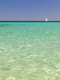Italy, Sardinia, Olbia-Tempo, Berchidda, a Sailing Boat Out at Sea Photographic Print by Nick Ledger