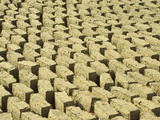Mud Bricks Drying in the Sun, Mali Photographic Print by Gary Cook