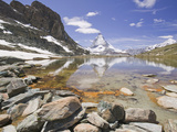The Matterhorn Reflected in a Mountain Lake Above Zermatt, Switzerland Photographic Print by Ashley Cooper