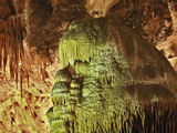 Caveman, Stalactites and Flowstone Formations Photographic Print by Adam Jones