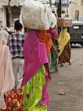 Colorful Indian Women in Traditional Saris Leaving Market in Udaipur with Containers on their Heads Photographic Print by Adam Jones