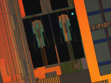 Micrograph of a Computer Microprocessor in Comparison with a Pollen Grain (Blue Dot), LM X200 Photographic Print by Robert Markus