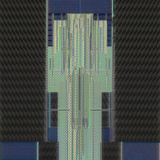 Micrograph of a Computer Microprocessor, LM X400 Photographic Print by Robert Markus