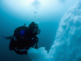 Antarctic Scuba Diver Swimming Near the Underwater Portion of an Iceberg Photographic Print by Louise Murray