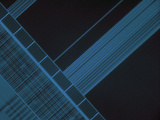 Micrograph of Computer Microprocessor, LM X200, Epifluorecence, UV Illumination Photographic Print by Robert Markus