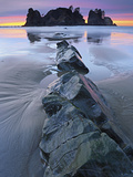 Ribbons of Sunset Light on the Horizon Silhouette the Sea Stacks at Point of the Arches Photographic Print by Geoffrey Schmid