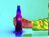 Thermogram of Man's Hand Holding a Cold Beer Bottle Photographic Print by  GIPhotoStock