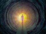 Out of the Cold Light at the End of the Tunnel Concept of a Person Moving Toward Recovery Photographic Print by Carol & Mike Werner