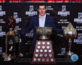 Evgeni Malkin with the 2012 Ted Lindsay Award, the Art Ross Trophy and the Hart Trophy Photo