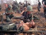 Medics Treat Wounded Photographic Print by  Associated Press