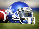 University of Kentucky - Kentucky Helmet Sits at Commonwealth Stadium Photographic Print