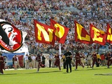 Florida State University - Team Flags Sprint across the Field Photographic Print by Mike Olivella