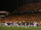 West Virginia University - West Virginia Defeats Auburn Photographic Print
