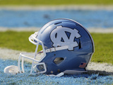 University of North Carolina - UNC Helmet Sits at Kenan Stadium Photographic Print