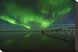 Northern Lights Reflected in Lake Winnipeg I Stretched Canvas Print by Mike Grandmaison