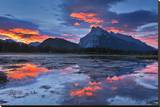 Mount Rundle Reflected in Vermillion Lake Stretched Canvas Print by Mike Grandmaison