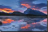 Mount Rundle Reflected in Vermillion Lake Stretched Canvas Print by Mike Grandmaison