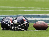 Houston Texans - Sept 9, 2012: Houston Texans Helmet and Football Photographic Print by David J. Phillip