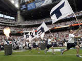 Houston Texans - Sept 9, 2012: T-E-X-A-N-S Flags Photographic Print by David J. Phillip
