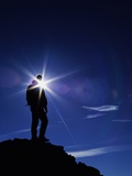Colorado Hiker Silhouette with Lens Flare and Blue Sky Photographic Print by Kevin Lange