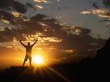 Klan00084 Silhouette Sunset Man Happy Sky in the New Mexico Sandia Mountains Photographic Print by Kevin Lange