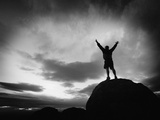 Silhouette Man Arms Raised into the New Mexico Sky in Black and White Photographic Print by Kevin Lange