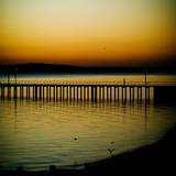 A Jetty with a Figure Photographic Print by Mark James Gaylard